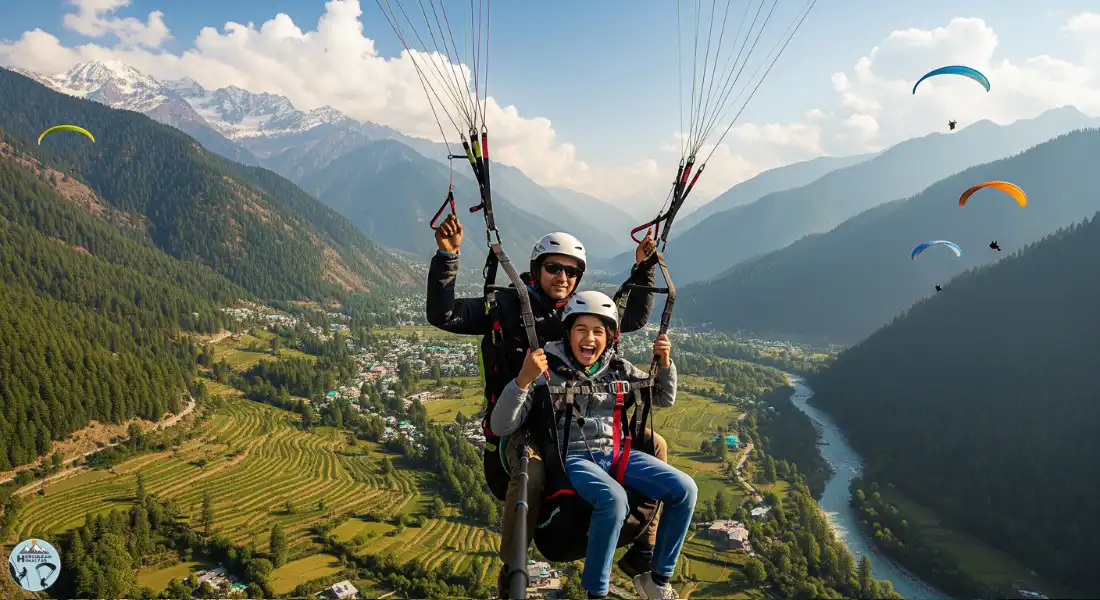Child enjoying tandem paragliding in Manali with pilot, safe harness, Beas River and snowy mountains view in background